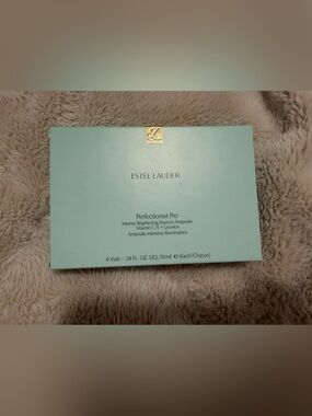 Estee Lauder Light Aqua Box with Gold Logo Accent